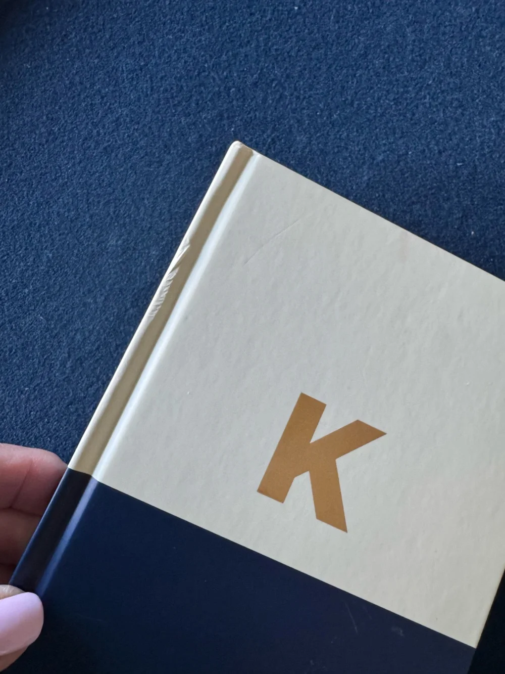 kate spade ♠️ cream, and purple lined Notebook with coordinating ribbon marker